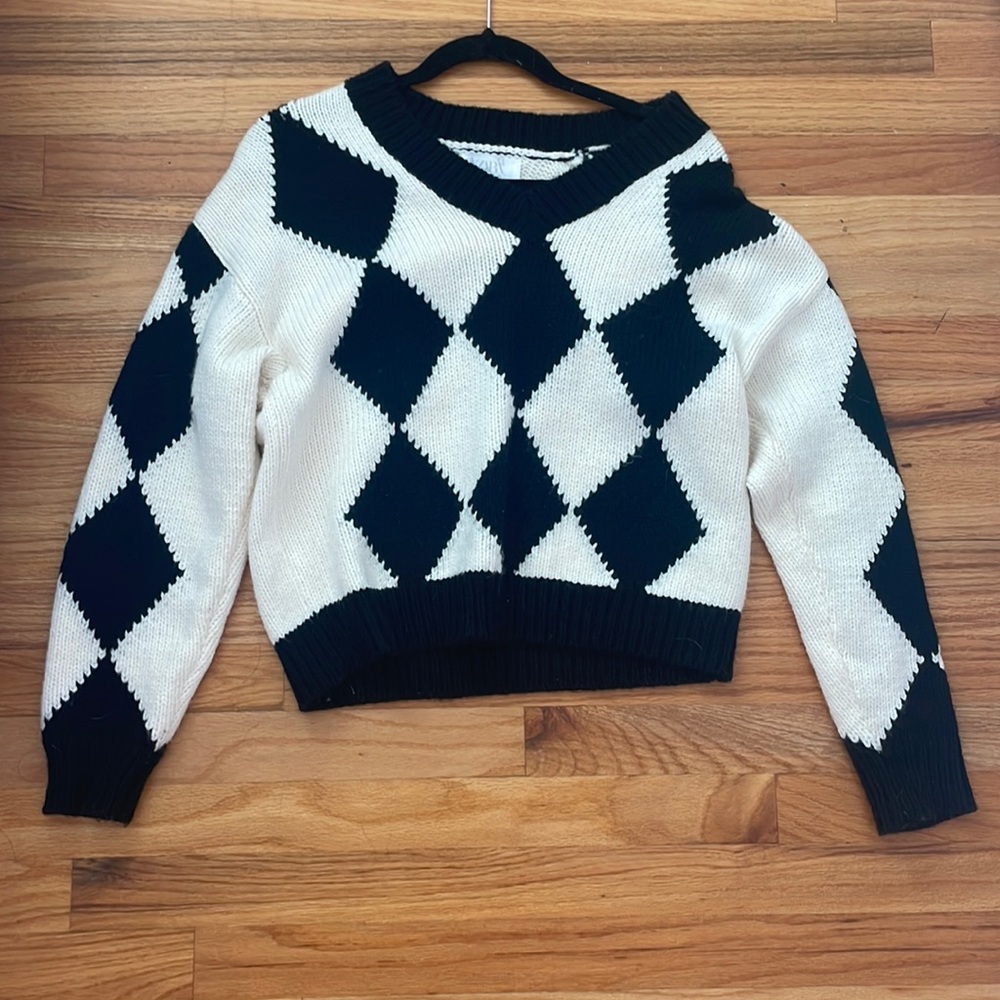 Black and white checkered sweater